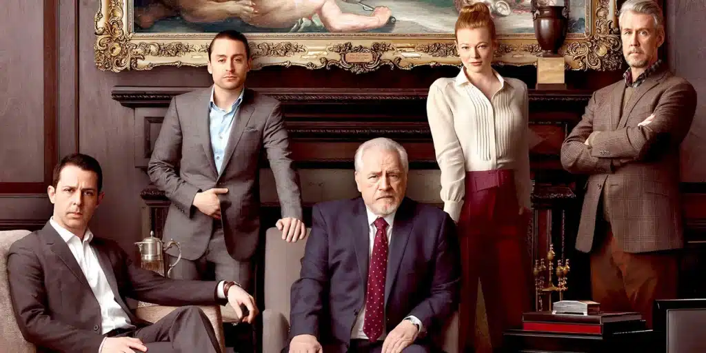 Five characters from HBO's Succession, dressed in formal attire, embodying corporate power dynamics and patriarchal dominance in a lavish, wood-paneled setting.
